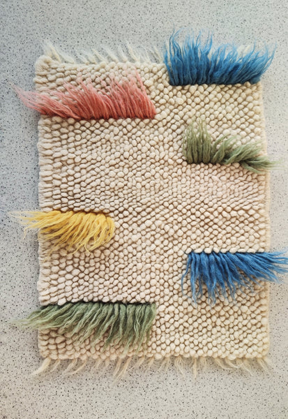 Textured White Wool Zhvanchyk Gulki Kids Rug in a cozy nursery