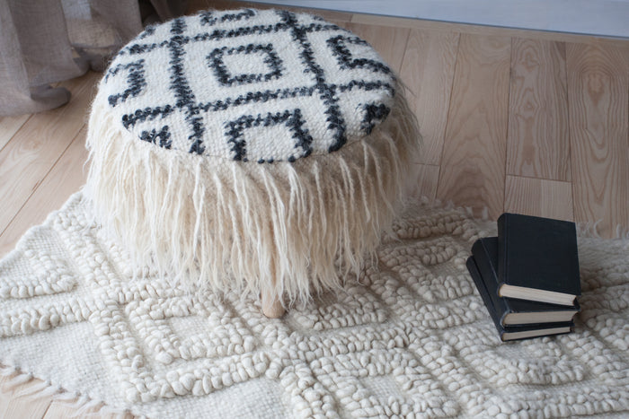 Handcrafted Mapico Pouf in a contemporary living room