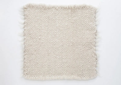 Samples of materials for the white pouf